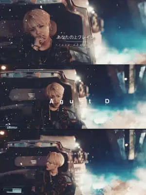 Agust D striking a powerful pose against a graffiti backdrop
