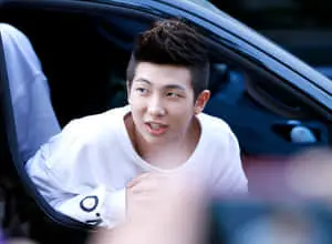 BTS Rap Monster striking a confident pose
