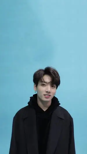 Handsome BTS JK Portrait Over Pastel Blue