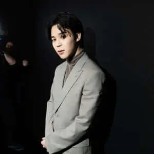 Jimin from BTS showcasing his signature style on stage